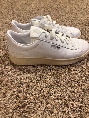 K-Swiss White Leather Low-Top Sneakers with Gold Detailing
